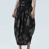 【SIMPLE BLACK】ビッグフラワープリントカーゴコクーンロングスカート WMD26061 - WAMODA