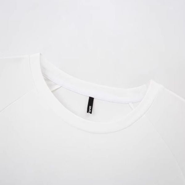 【SIMPLE BLACK】クルーネックアシンメトリープリーツコットンTシャツ WMD26055 - WAMODA