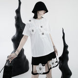 ハーネスベルト風デザインフラワーモチーフTシャツ WMD19014 - WAMODA